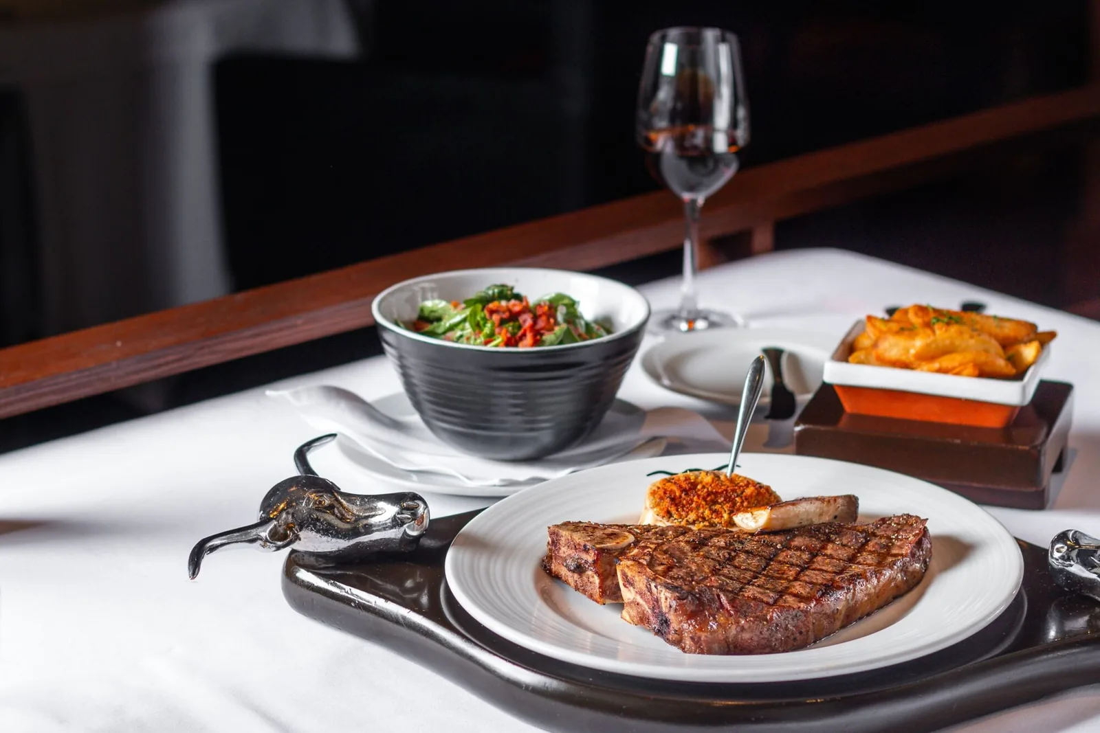 New York Steakhouse - steak dinner table setting