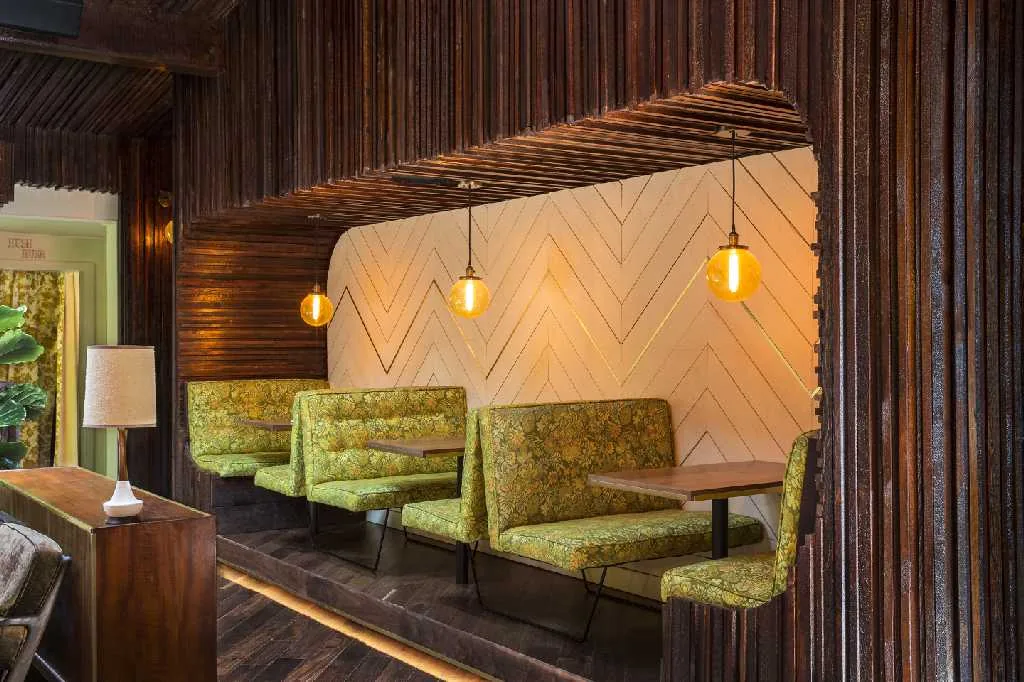 The Nice Guy - nice guy green floral booths retro