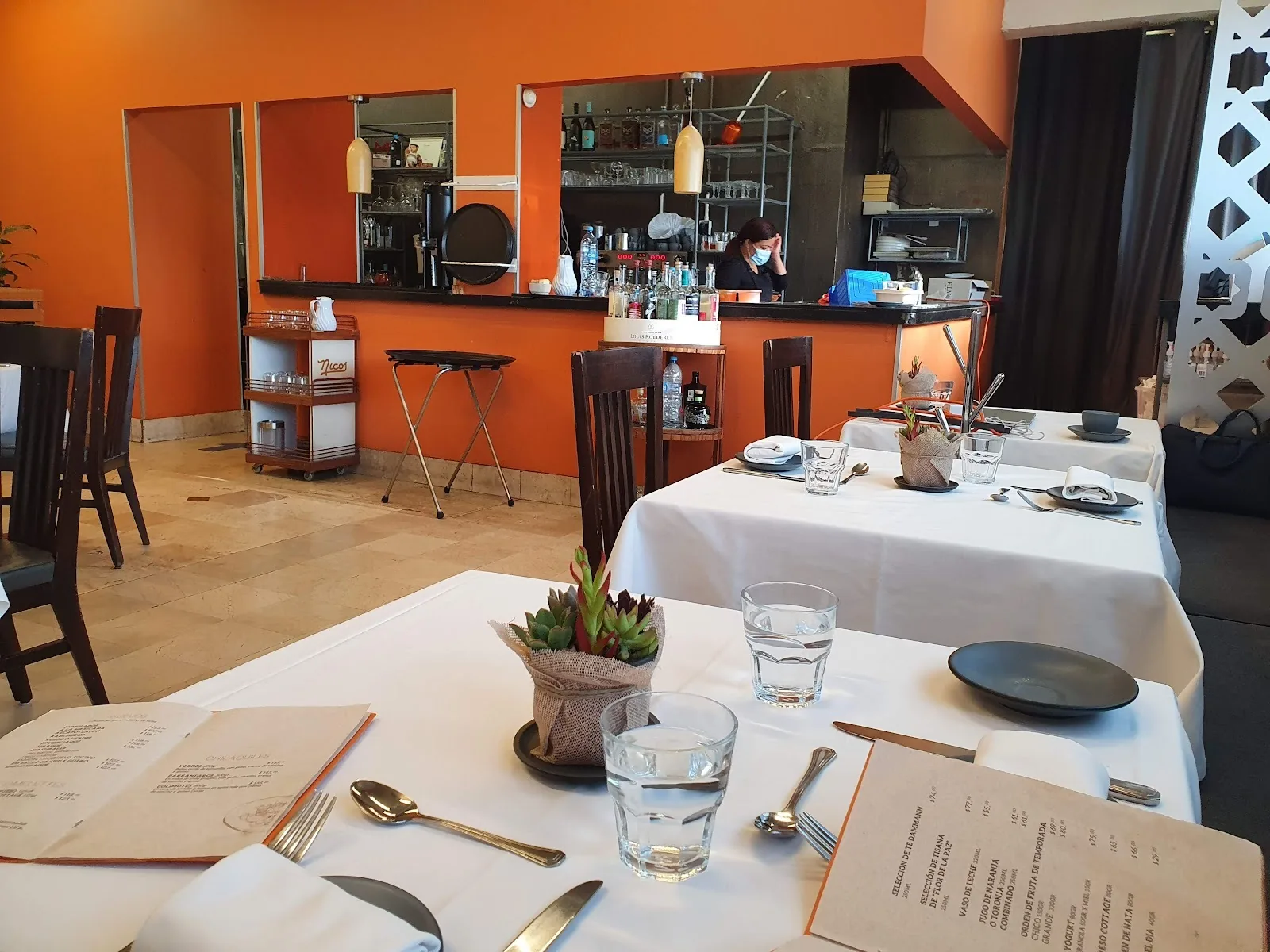 Nicos - set table in the dining room