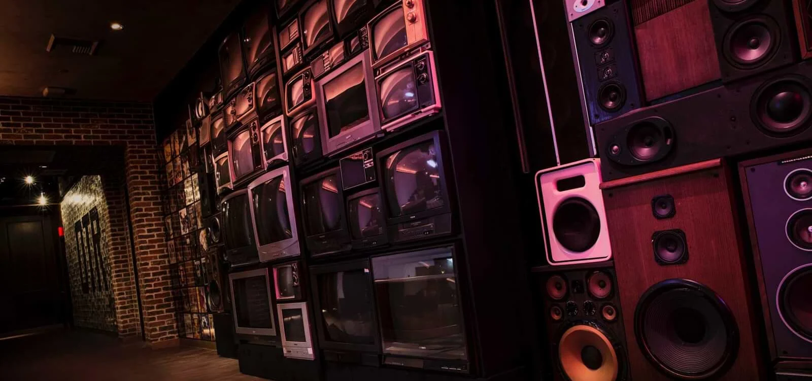 On The Record at Park MGM - on the record living room wall of vintage speakers and hi fi stacks