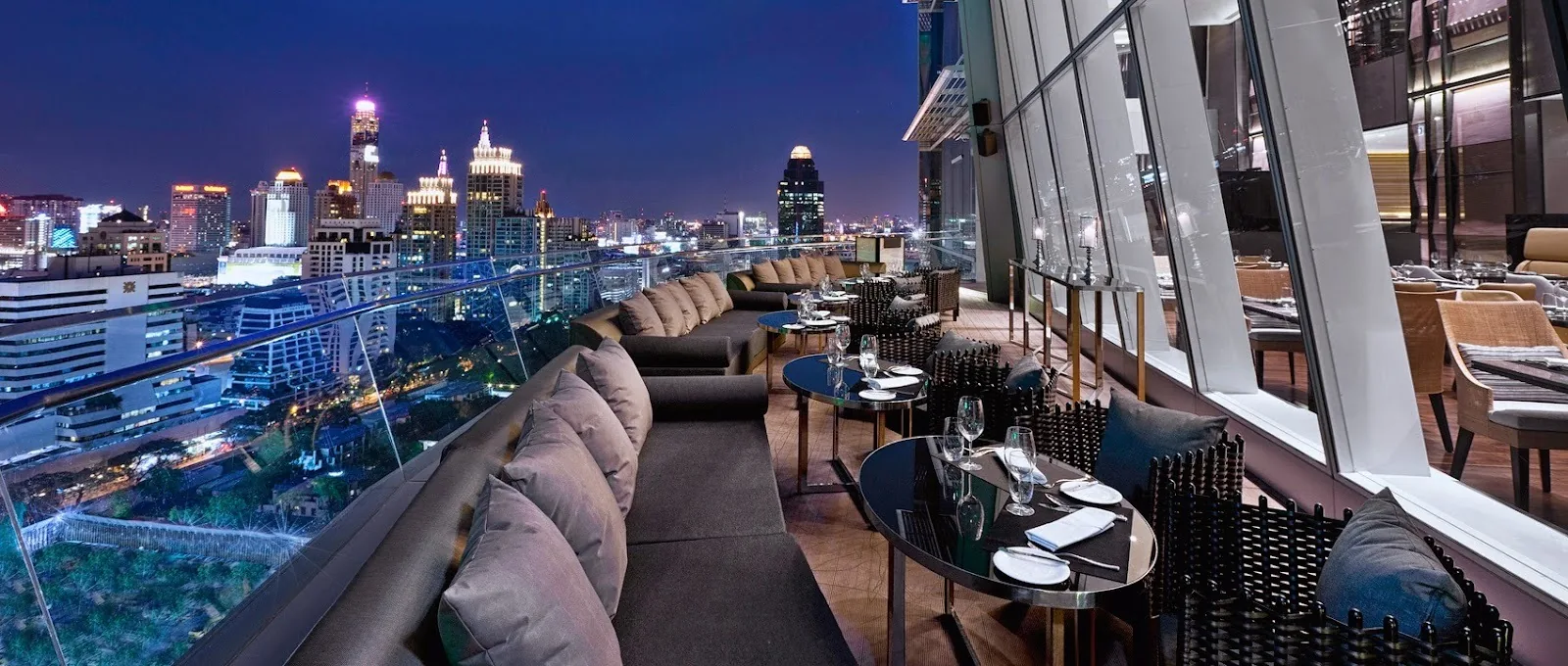 Penthouse Bar - rooftop lounge night skyline