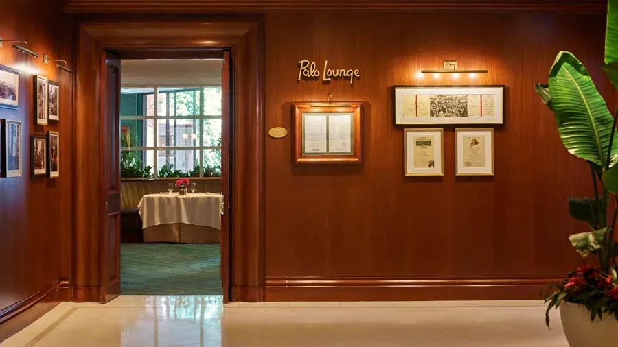 The Polo Lounge - polo lounge entrance gold signage