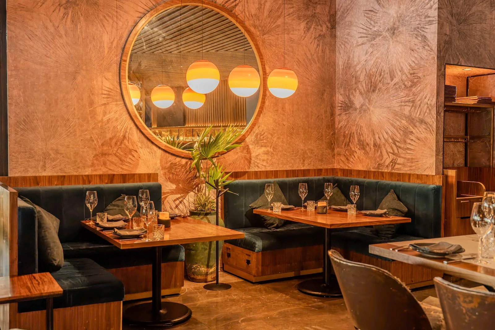 Porfirio's - booth under a copper lamp