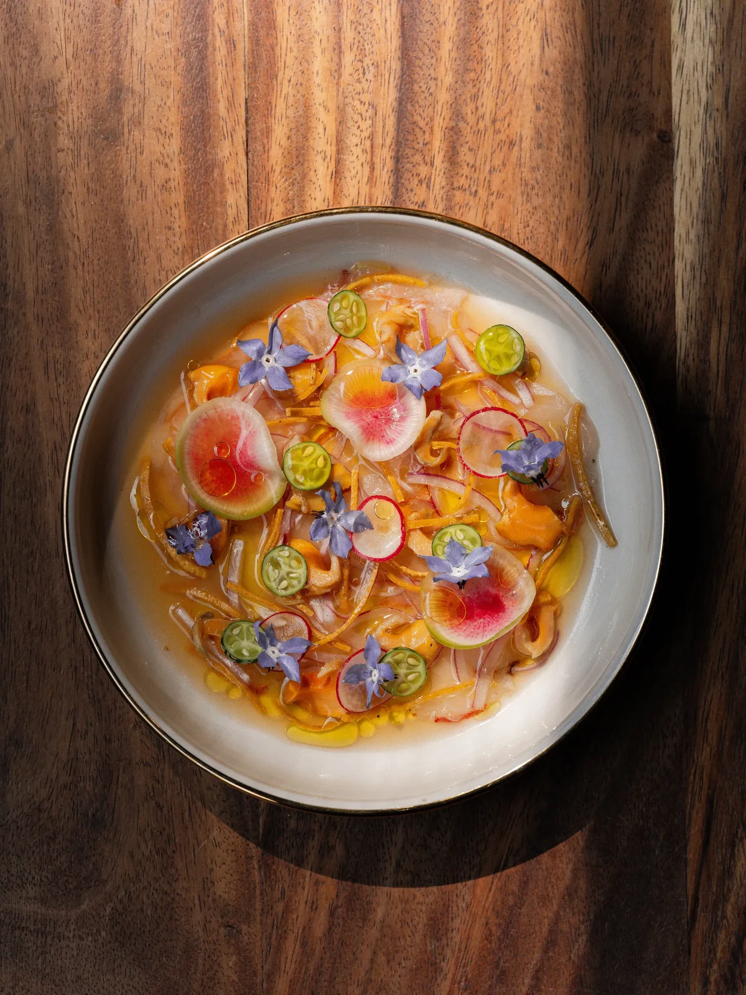 Pujol - flower garnished plated dish