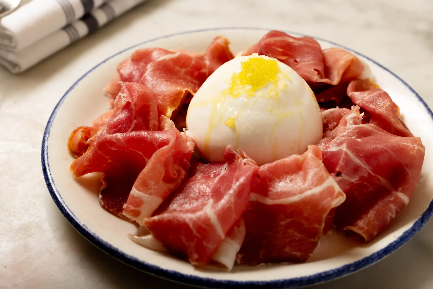 Rezdora - burrata and cured meat