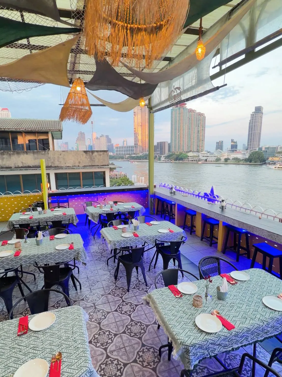 Rim Rooftop Dining - set tables river view