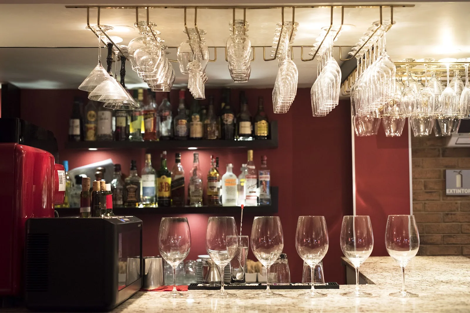 Ristorante Romina - interior wine bar hanging glassware