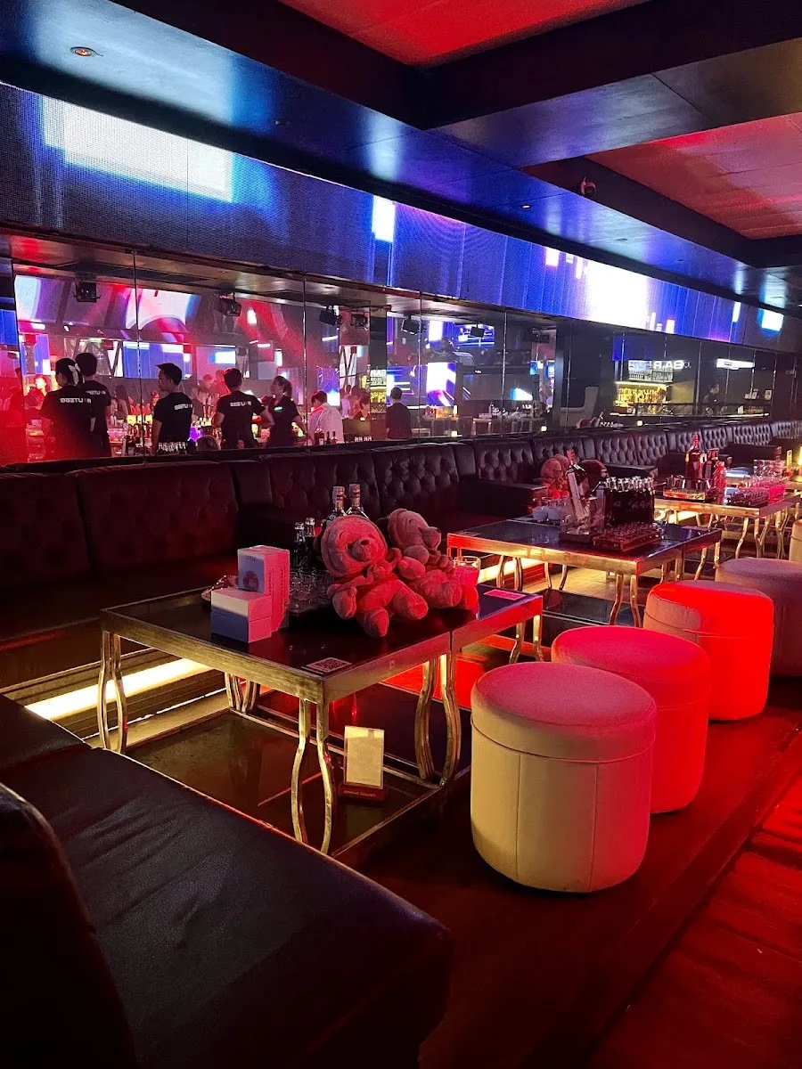 Route 66 - add vip section red velvet booths gold tables over the main led lit club hall