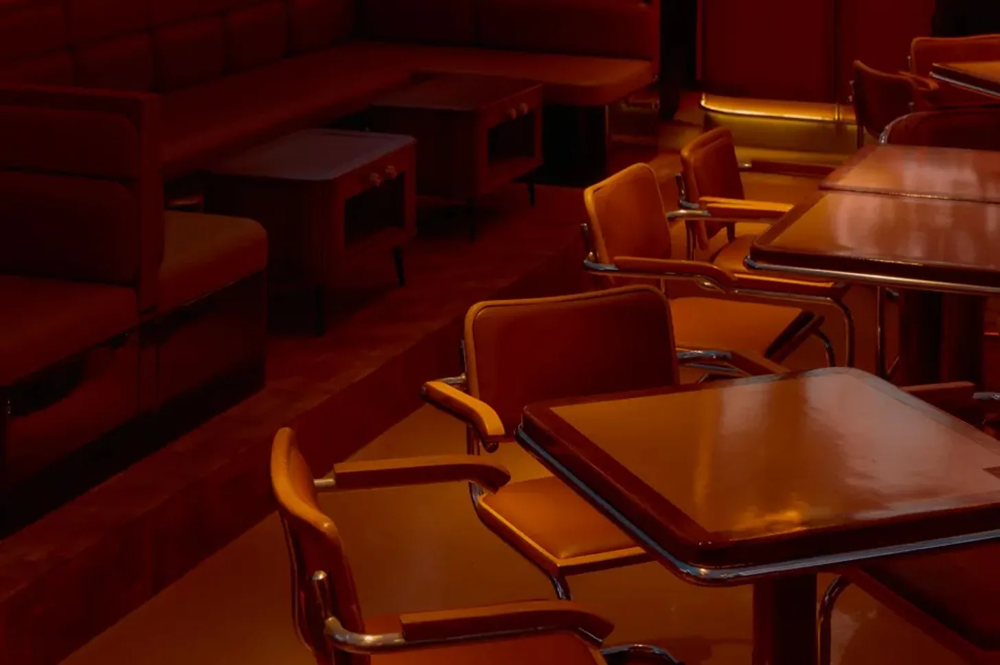 Salon Camarena - booth and table seating in warm wood