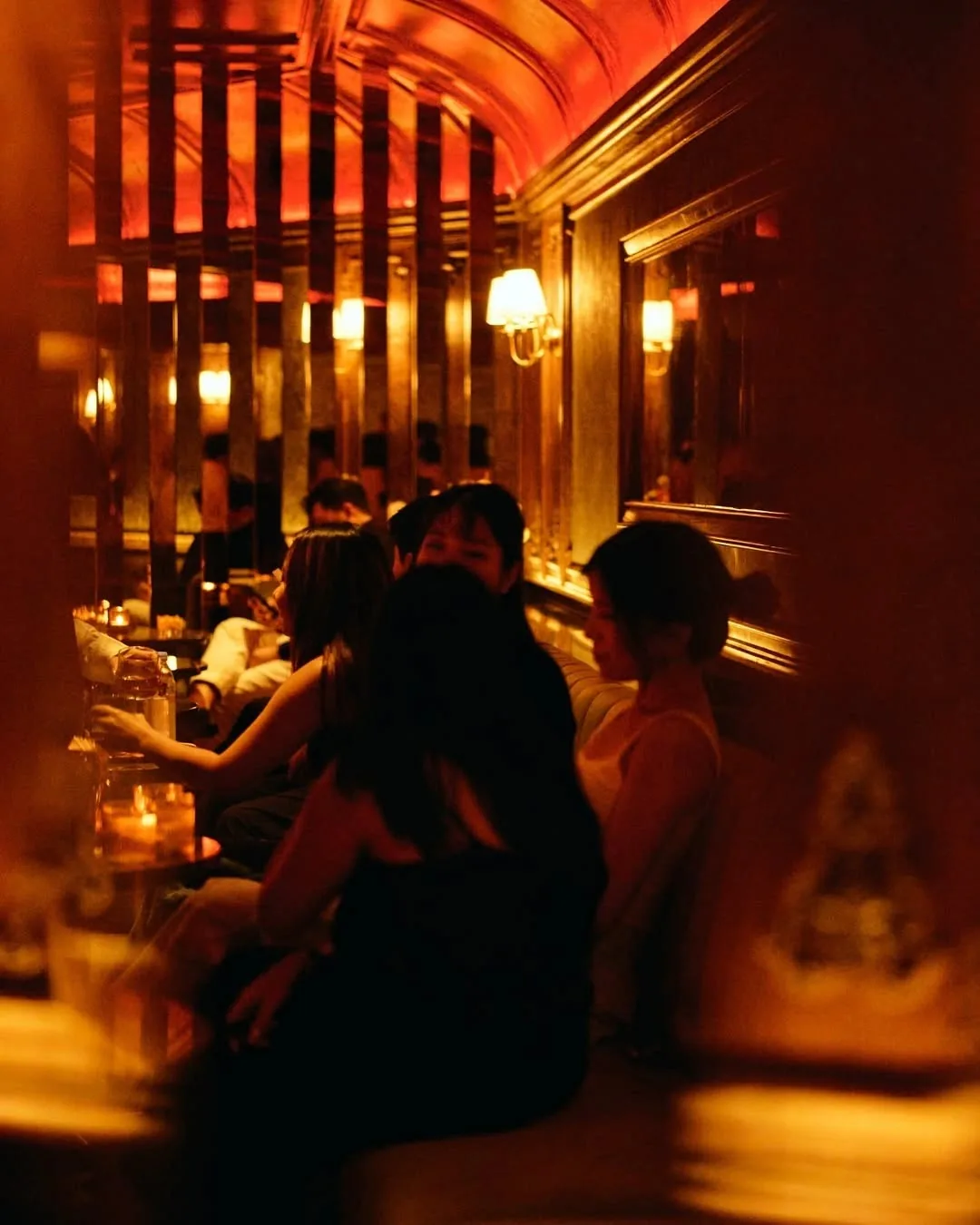 Salone di Vita - crowd banquette lounge warm light