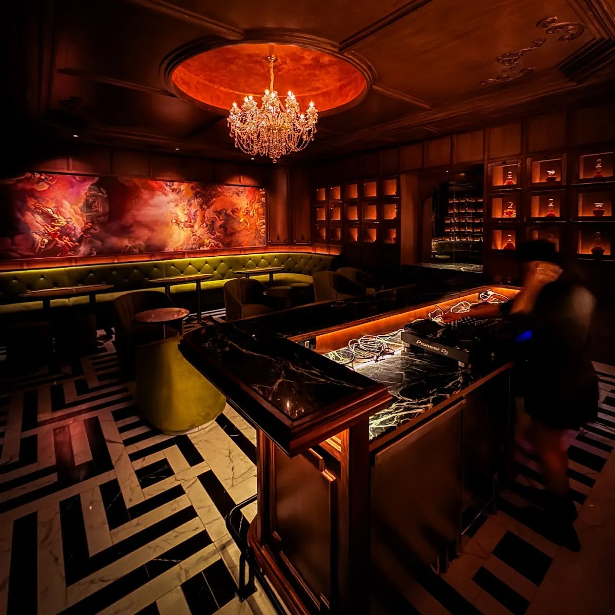 Salone di Vita - add opulent main lounge crystal chandelier gold green velvet booths bar black white geometric floor