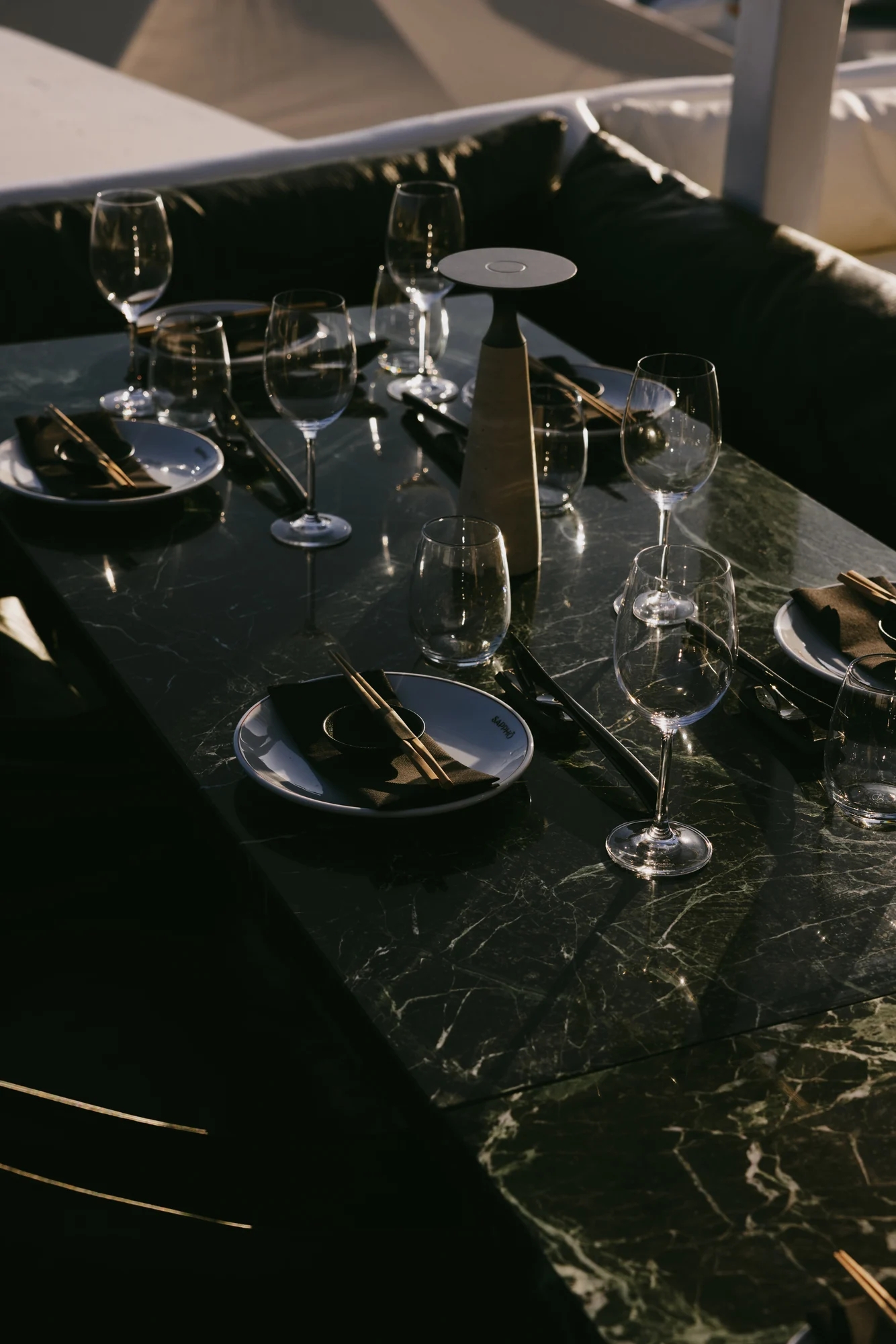 Sappho - terrace table setting golden hour