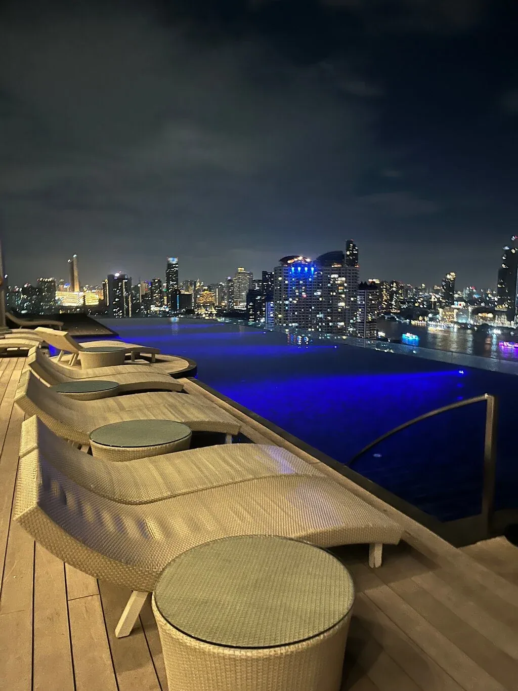 SEEN Restaurant - add rooftop infinity pool loungers night skyline