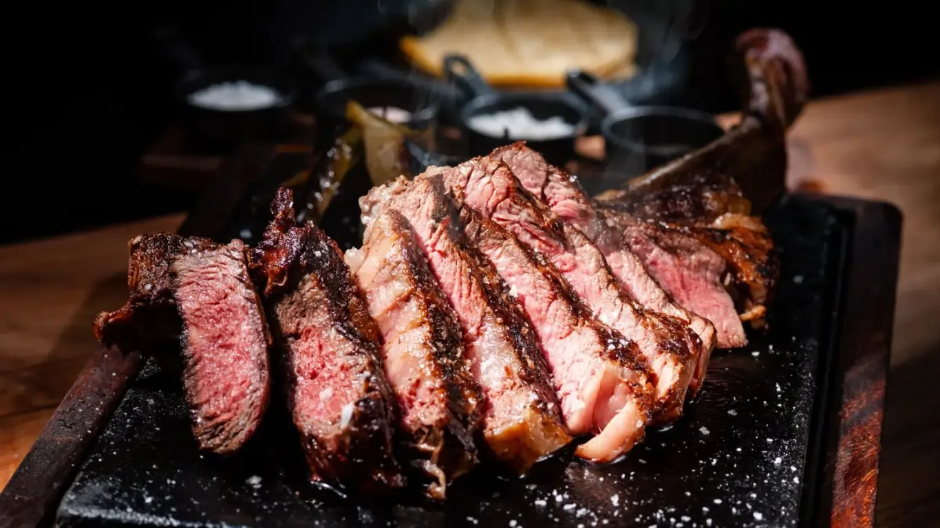 Sonora Grill Prime - sliced rib eye on hot stone