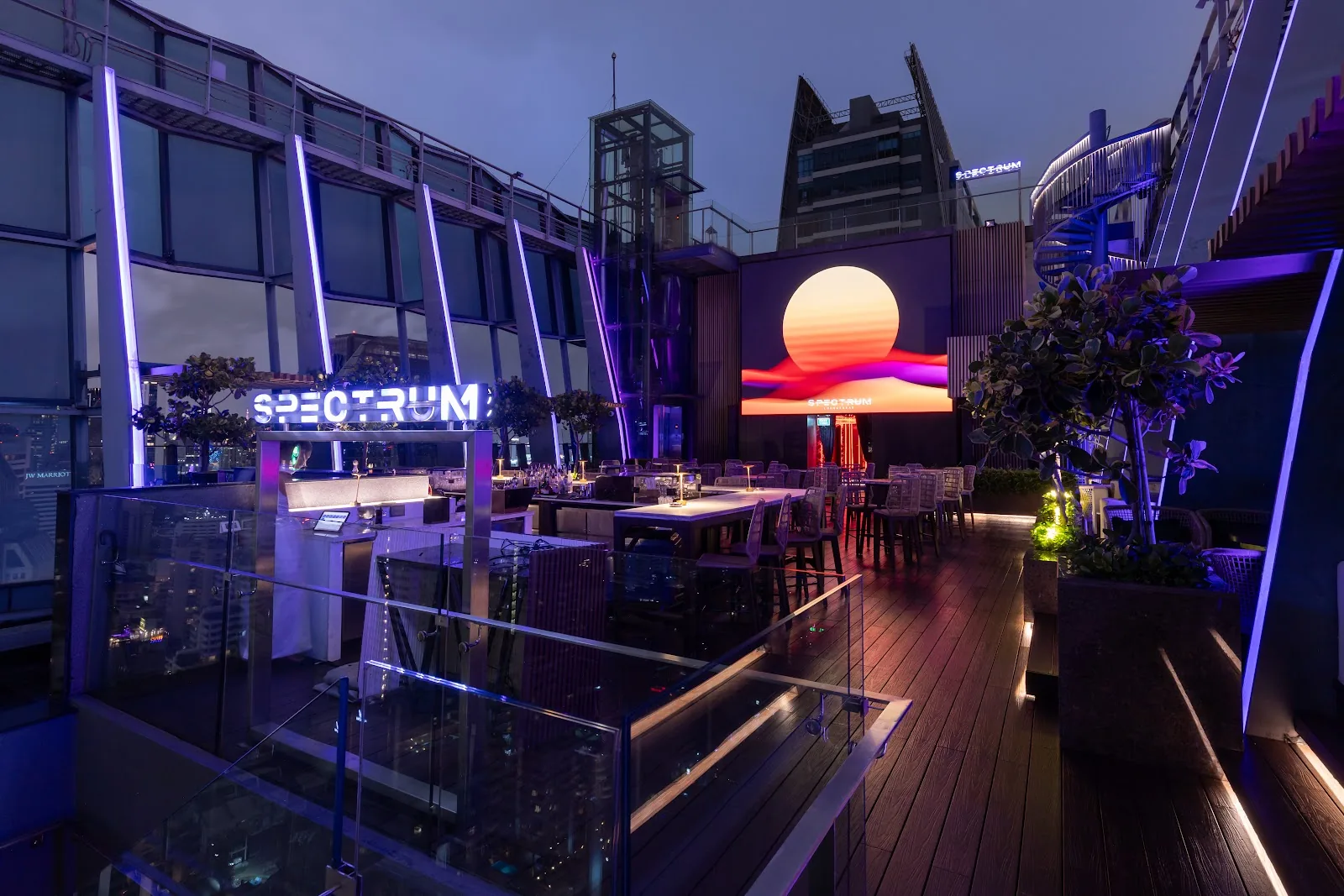 Spectrum Lounge - rooftop bar signage purple lighting