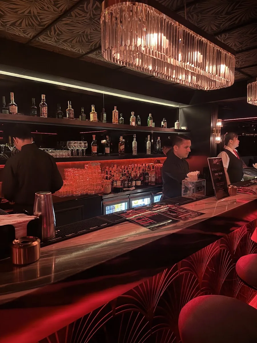 Sugar Club - add crystal chandelier bar art deco red ambient