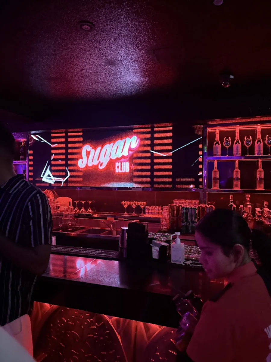 Sugar Club - add sugar club neon sign bar bottle display