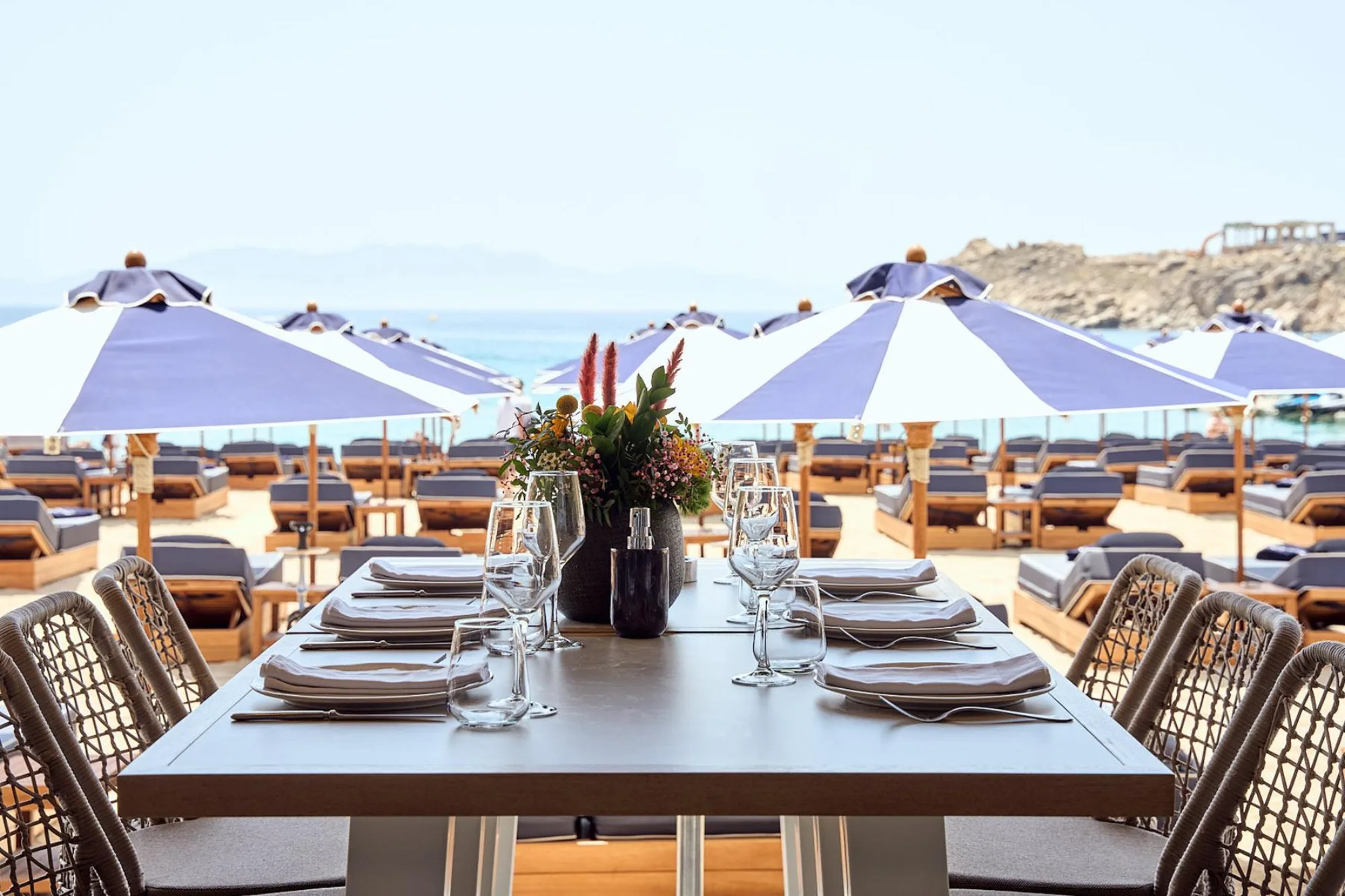 Super Paradise Beach Club - beachfront dining tables