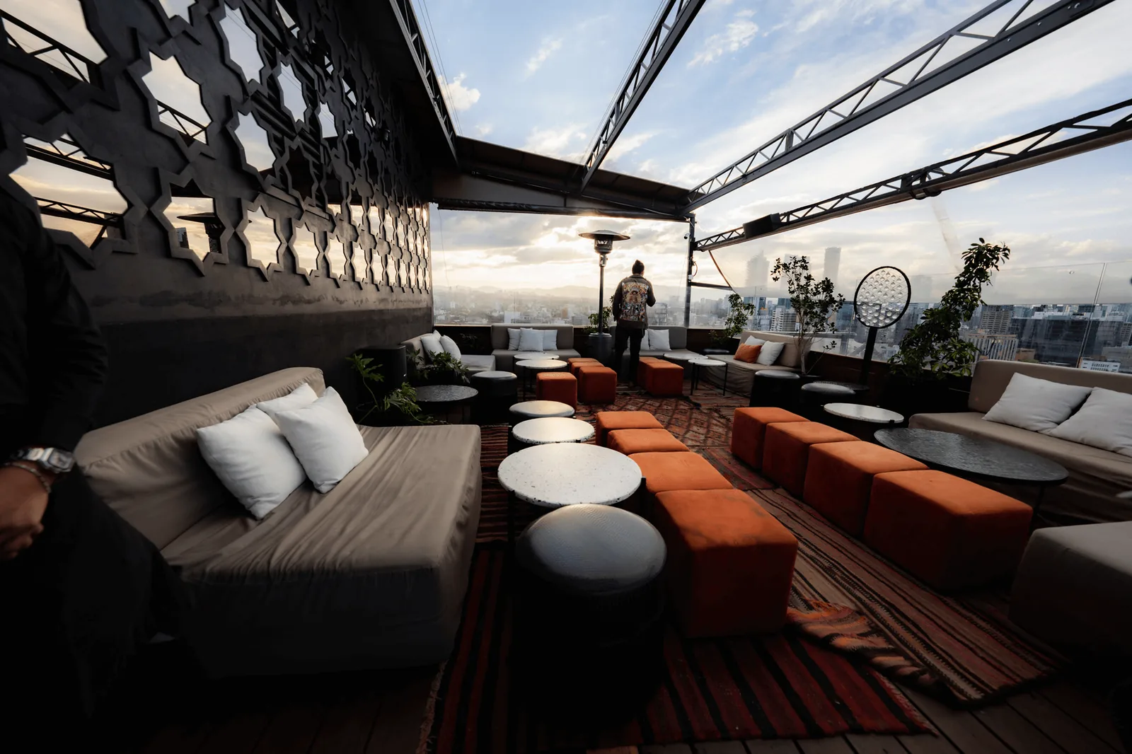 Supra Roma Rooftop - daybeds and low tables on the terrace lo