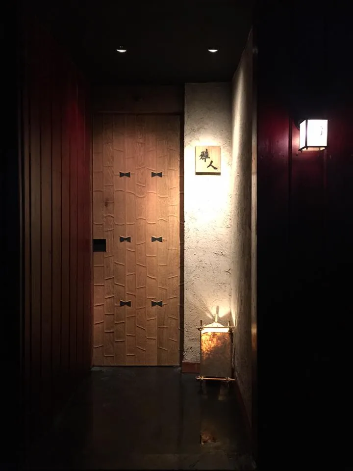 Sushi Masato - add entrance corridor hinoki slat walls lit kanji door stone lantern