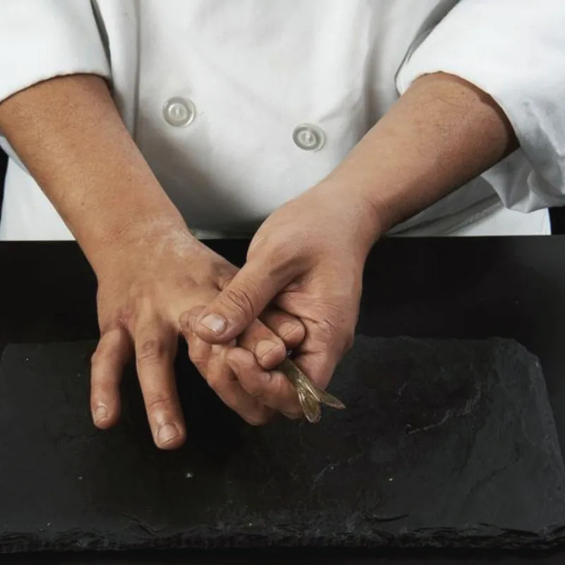 Sushi Nakazawa - chef hands nigiri