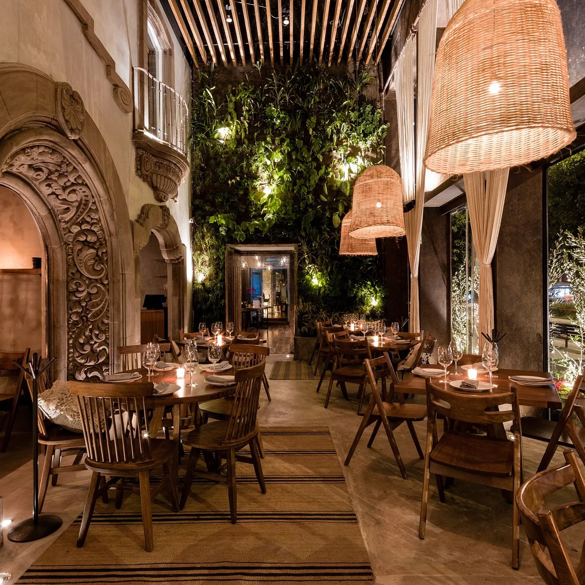 Taboo Polanco - candlelit dining under the carved arch