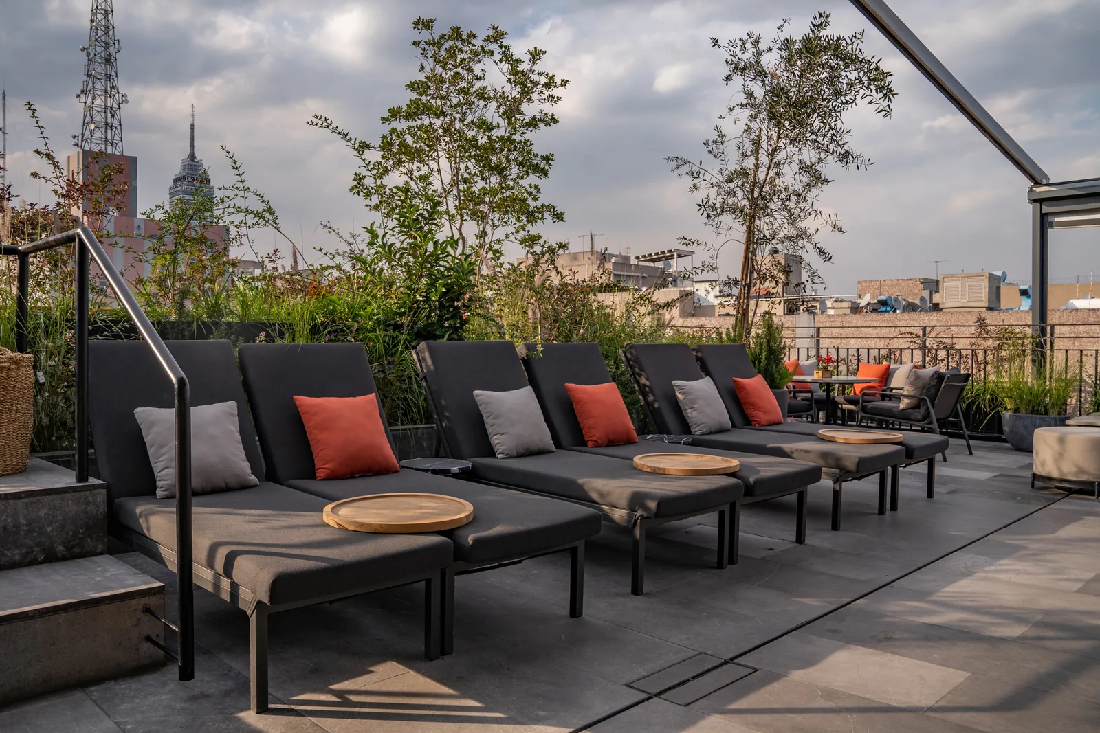 Terra Alta - row of sun loungers with the torre latin