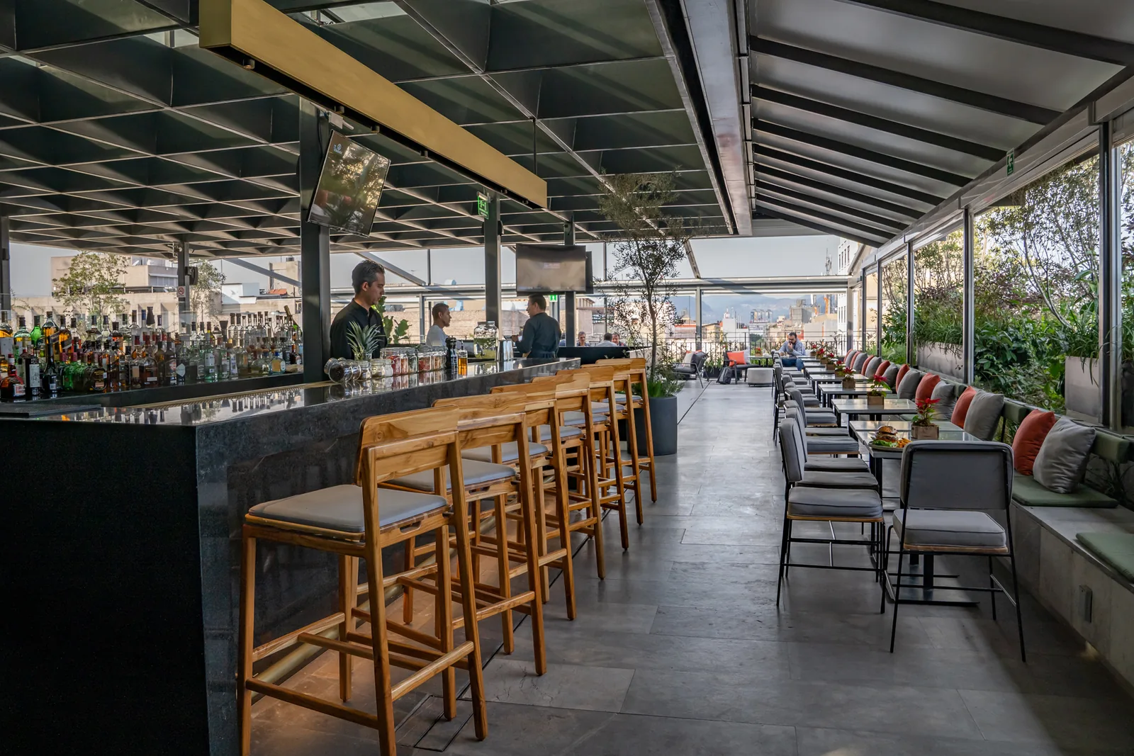 Terra Alta - rooftop bar counter with stools running