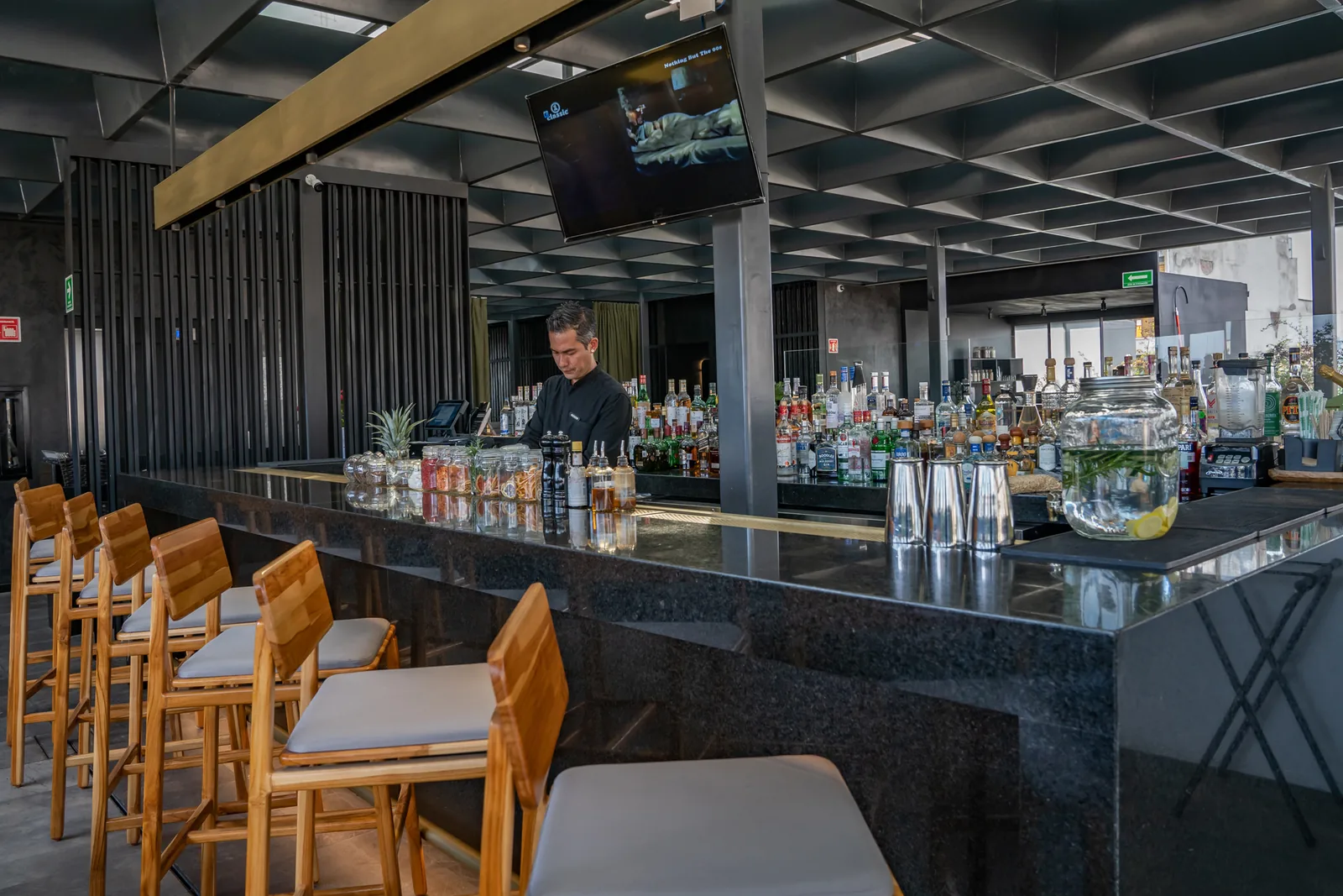 Terra Alta - bar back with bottle display and bar sea