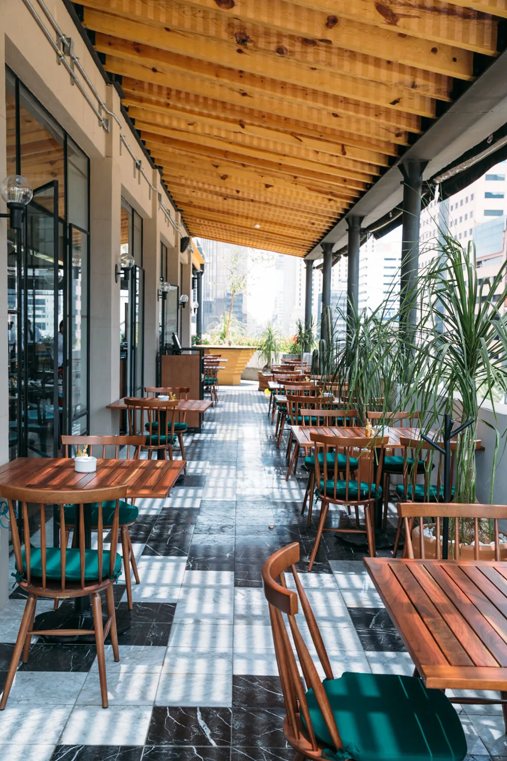 Terraza Cha Cha Cha - covered terrace with long wooden tables