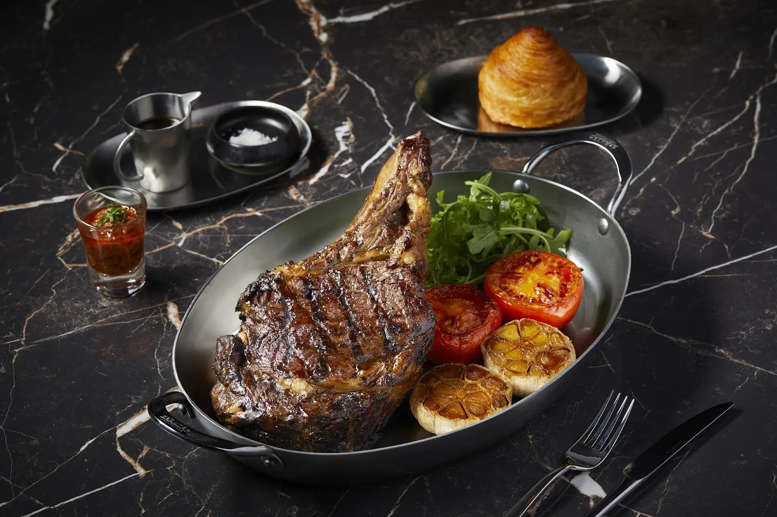 The Crystal Grill House - tomahawk steak skillet