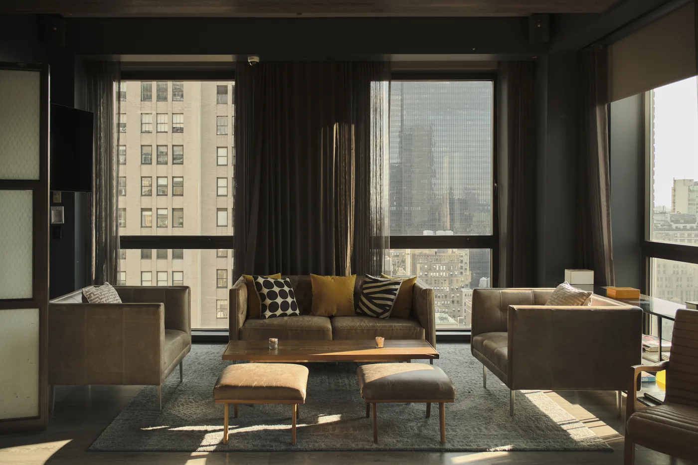 The Skylark - indoor lounge leather sofas city windows