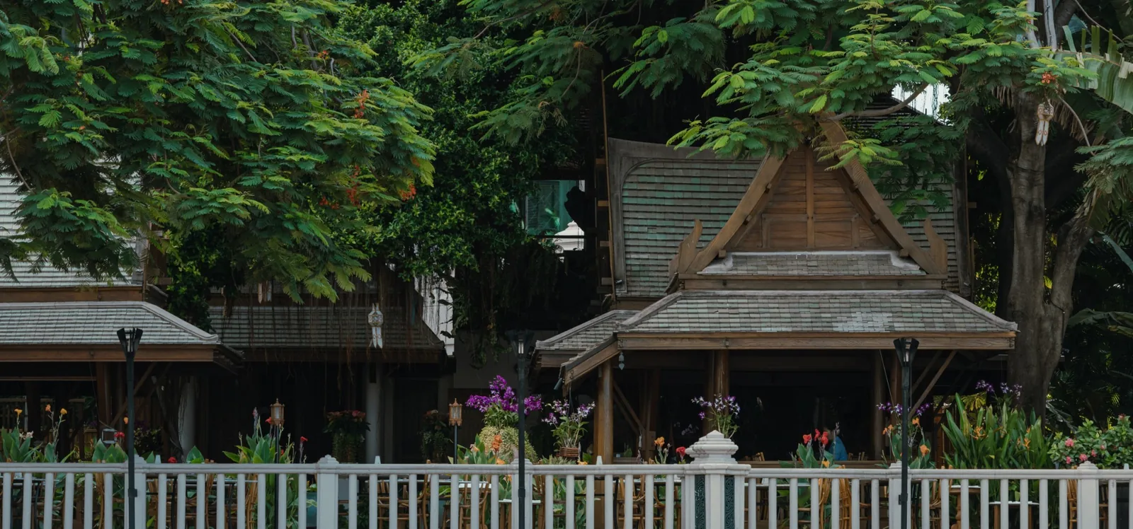 Thiptara - traditional teak salas framed by tropical gardens ambiance
