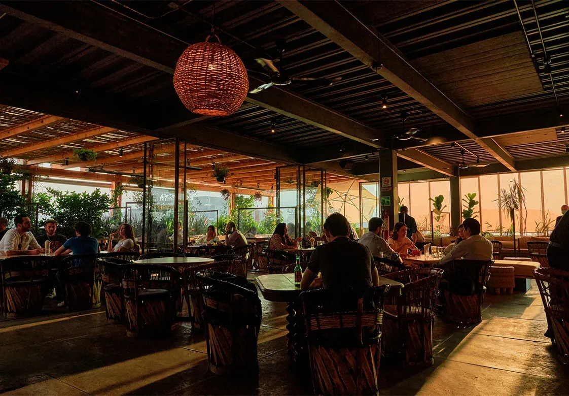 Toledo Rooftop - warm interior with woven lanterns at sun