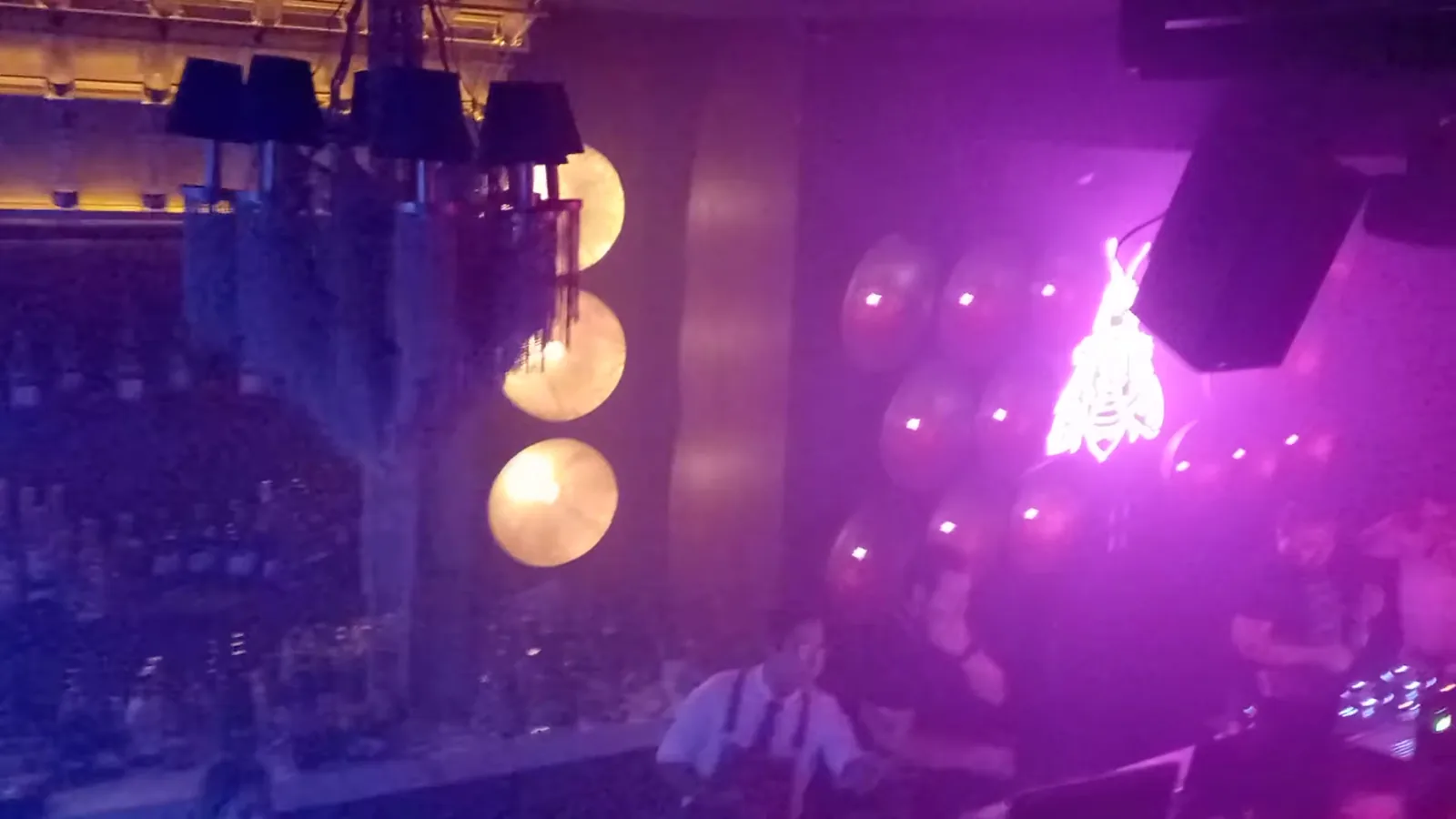 Vanderbilt Polanco - lounge with globe lamps under purple lig