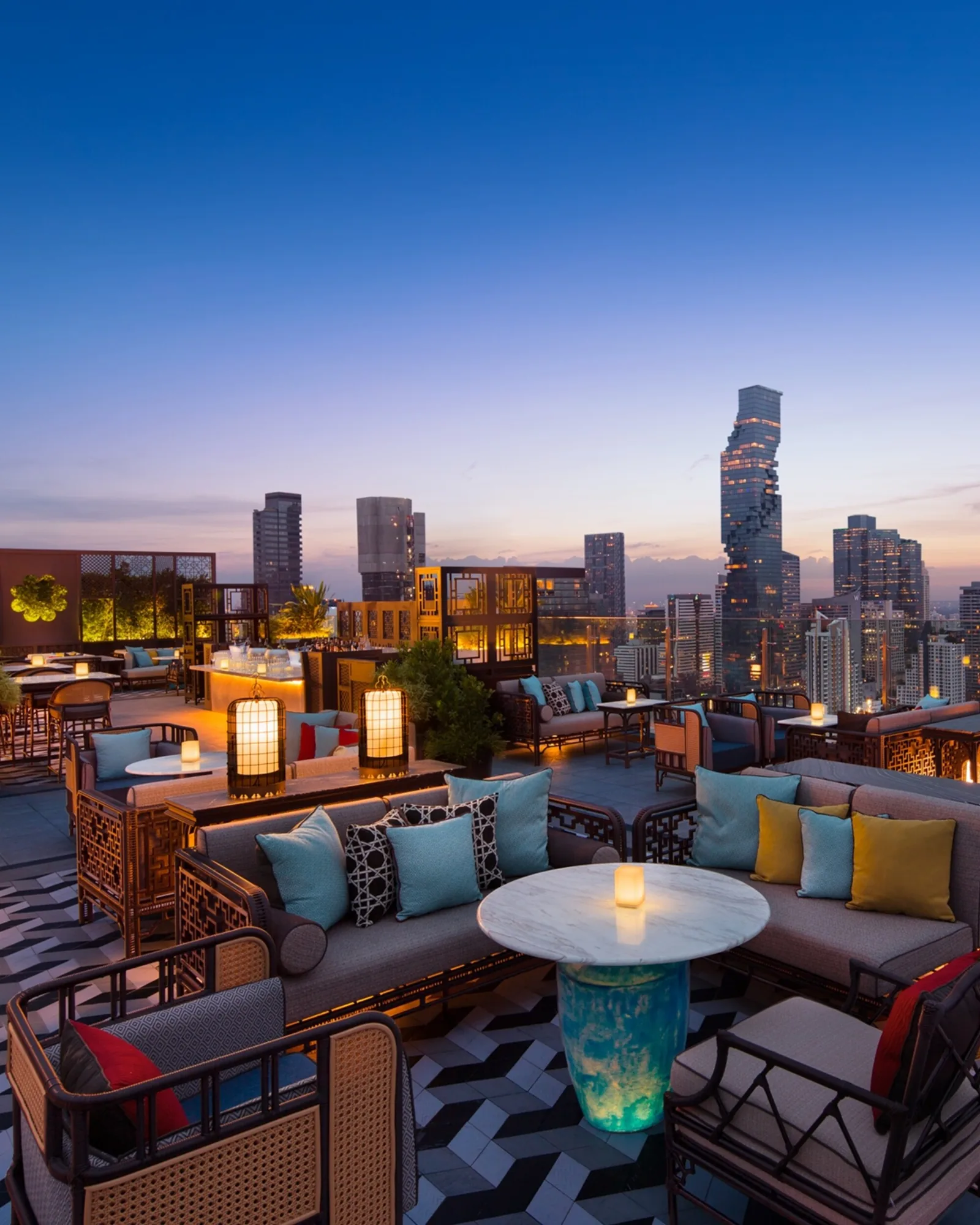 Yào Restaurant & Rooftop - rooftop deck cushion seating dusk skyline