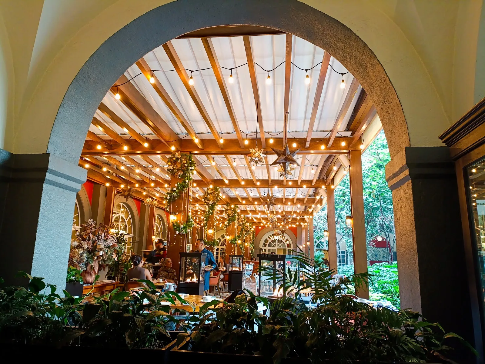 Zanaya - interior arched entry to pergola