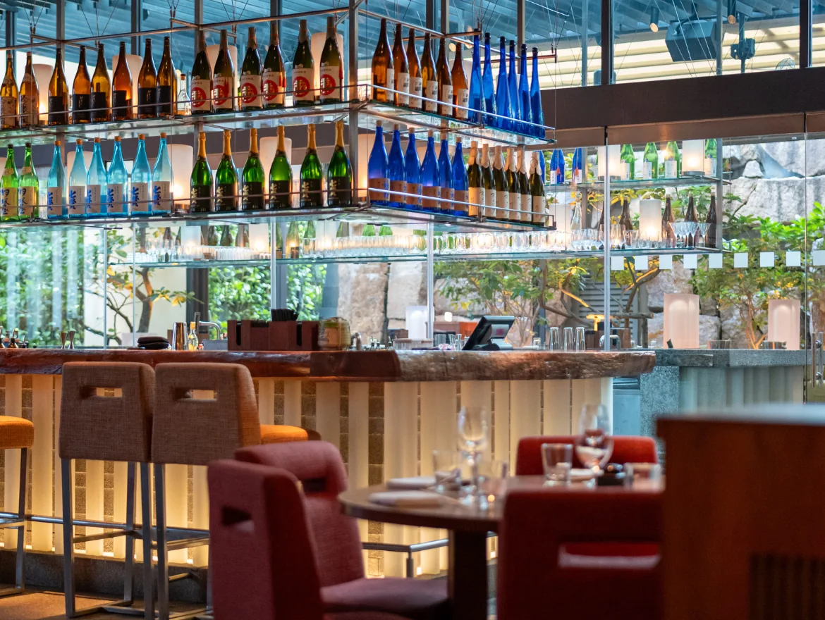 Zuma - bar and lounge with the illuminated wall of sake and japanese whisky non food interior
